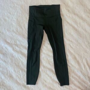 NWOT Athleta stash tights in olive green.